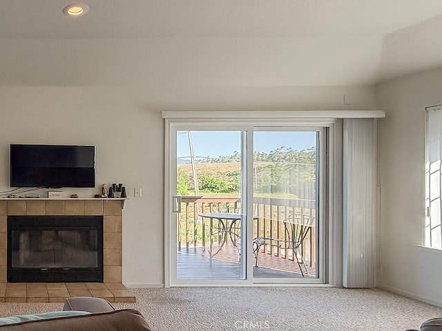 540 Pico Ave Unit 110, San Simeon, CA 93452 - entryway featuring carpet, a tiled fireplace, baseboards, and recessed lighting