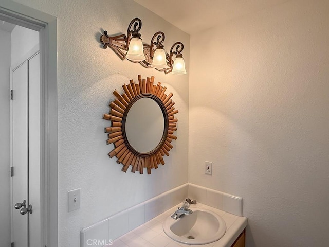 540 Pico Ave Unit 110, San Simeon, CA 93452 - bathroom with vanity and a chandelier