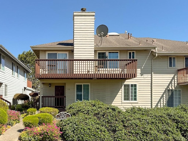 540 Pico Ave Unit 110, San Simeon, CA 93452 - back of house with a balcony and a chimney