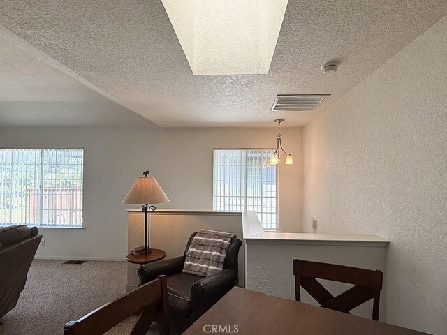 540 Pico Ave Unit 110, San Simeon, CA 93452 - carpeted home office with a textured ceiling, a textured wall, and baseboards