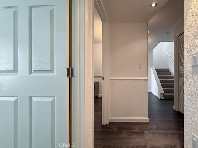 540 Pico Ave Unit 110, San Simeon, CA 93452 - corridor with dark wood-style flooring, wainscoting, stairway, and recessed lighting
