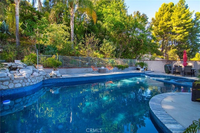 view of pool featuring a fenced backyard