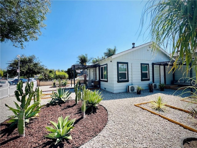 945 N Dickel St, Anaheim, CA 92805 - view of home's exterior featuring fence, a pergola, and a patio area