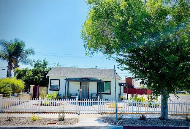 945 N Dickel St, Anaheim, CA 92805 - bungalow-style house featuring a fenced front yard