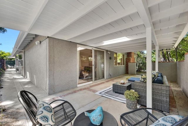 view of patio with a fenced backyard and outdoor lounge area