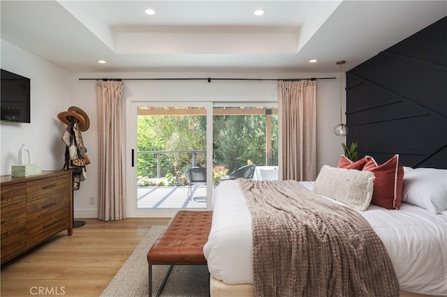 2315 Heather Ln, Newport Beach, CA 92660 - bedroom featuring access to exterior, a tray ceiling, light wood-type flooring, recessed lighting, and baseboards