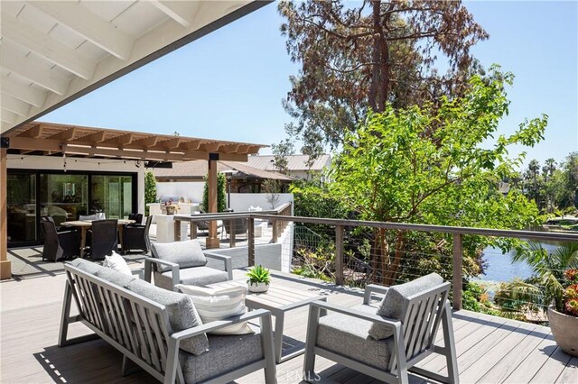 2315 Heather Ln, Newport Beach, CA 92660 - wooden deck featuring an outdoor living space, outdoor dining area, area for grilling, and a water view