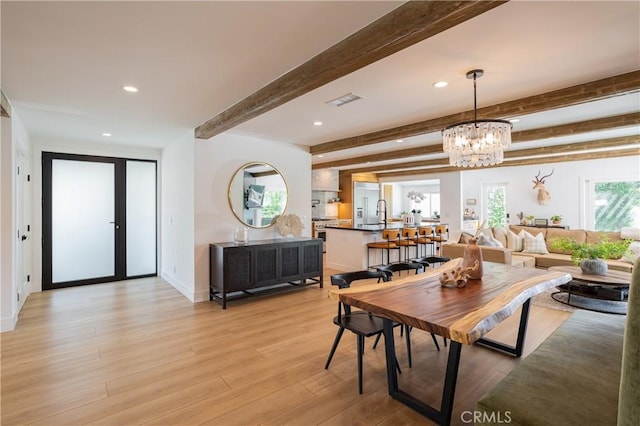 2315 Heather Ln, Newport Beach, CA 92660 - dining room featuring a chandelier, beam ceiling, light wood-type flooring, recessed lighting, and baseboards