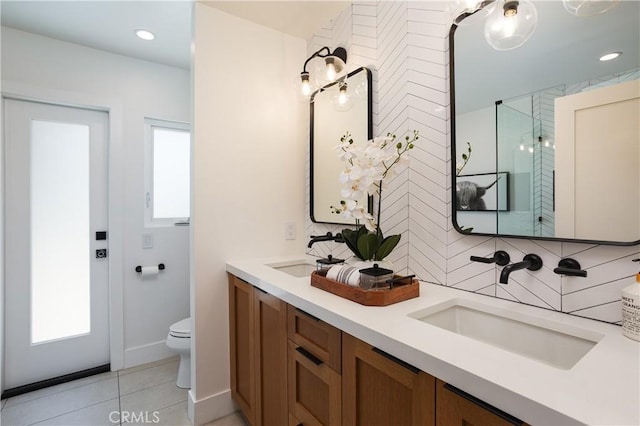 2315 Heather Ln, Newport Beach, CA 92660 - full bath featuring toilet, tile patterned flooring, double vanity, and a shower