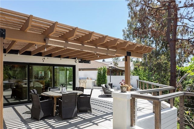 2315 Heather Ln, Newport Beach, CA 92660 - view of patio with outdoor dining space, a pergola, and exterior kitchen