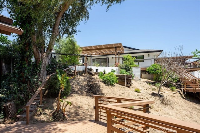 2315 Heather Ln, Newport Beach, CA 92660 - rear view of house with a wooden deck