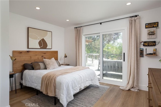 2315 Heather Ln, Newport Beach, CA 92660 - bedroom with access to outside, wood finished floors, and recessed lighting