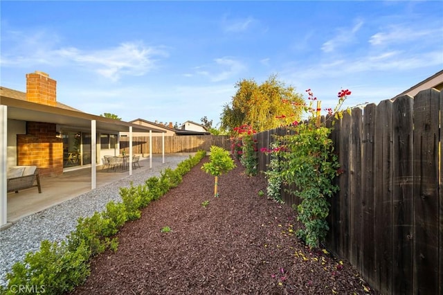 2812 Loyola St, Riverside, CA 92503 - fenced backyard with a patio area