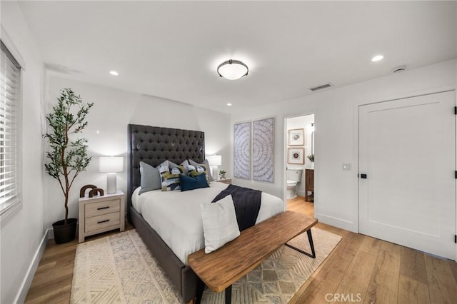 2812 Loyola St, Riverside, CA 92503 - bedroom with light wood-style floors, connected bathroom, recessed lighting, and baseboards