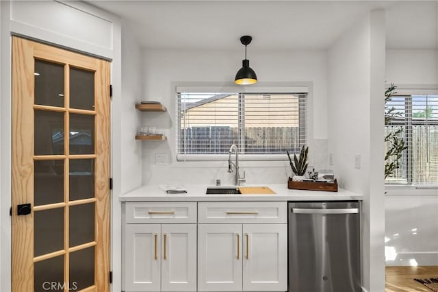 2812 Loyola St, Riverside, CA 92503 - bar area featuring dishwasher, a sink, and hanging light fixtures