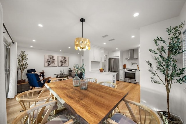 2812 Loyola St, Riverside, CA 92503 - dining space featuring light wood-style floors, recessed lighting, and a chandelier