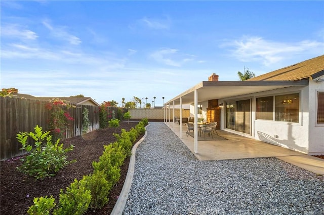 2812 Loyola St, Riverside, CA 92503 - fenced backyard with a patio area