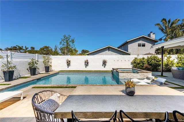17252 Breda Ln, Huntington Beach, CA 92649 - view of swimming pool featuring a patio area, a fenced backyard, and a pool with connected hot tub