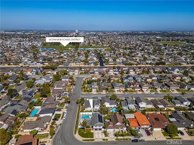 17252 Breda Ln, Huntington Beach, CA 92649 - aerial view of property and surrounding area with nearby suburban area