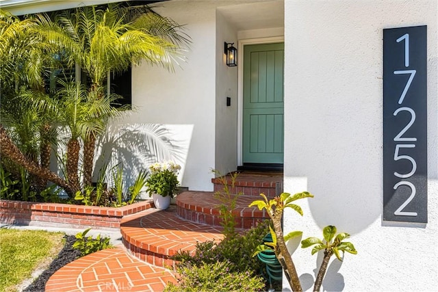 17252 Breda Ln, Huntington Beach, CA 92649 - doorway to property with stucco siding