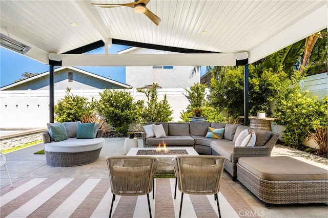 17252 Breda Ln, Huntington Beach, CA 92649 - view of patio featuring an outdoor living space with a fire pit, a fenced backyard, and a ceiling fan