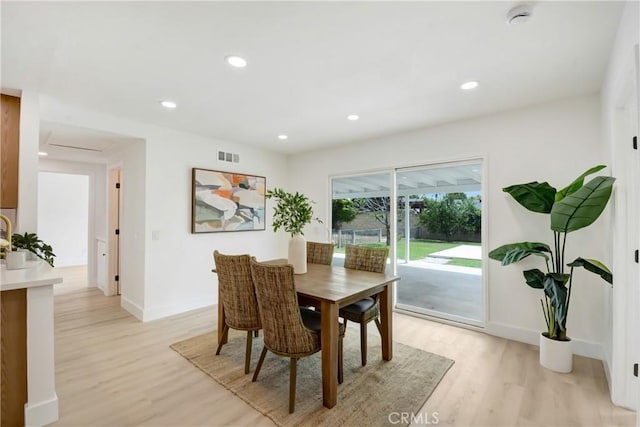 6445 Beryl St, Rancho Cucamonga, CA 91701 - dining space featuring light wood-style flooring, baseboards, and recessed lighting