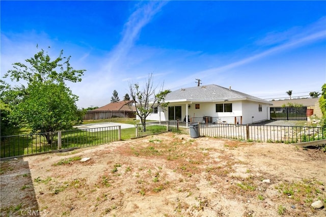 rear view of house featuring a patio area