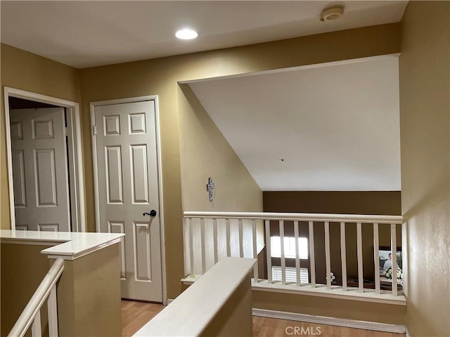 3342 Cobblestone Ln, La Verne, CA 91750 - hallway with light wood-style flooring, an upstairs landing, and recessed lighting