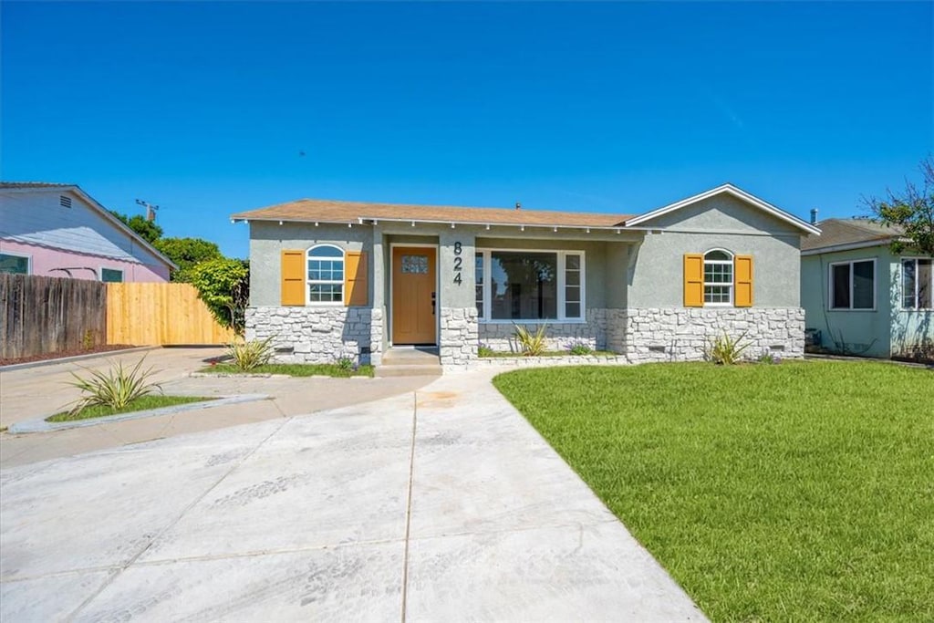 824 S Smith St, Santa Maria, CA 93458 - view of front facade with stone siding, stucco siding, and a shingled roof
