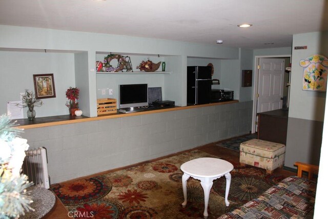 2205 Freeman Dr, Pine Mountain Club, CA 93225 - living area featuring radiator heating unit and electric panel
