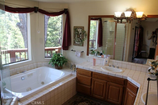 2205 Freeman Dr, Pine Mountain Club, CA 93225 - bathroom with vanity, a jetted tub, and a chandelier