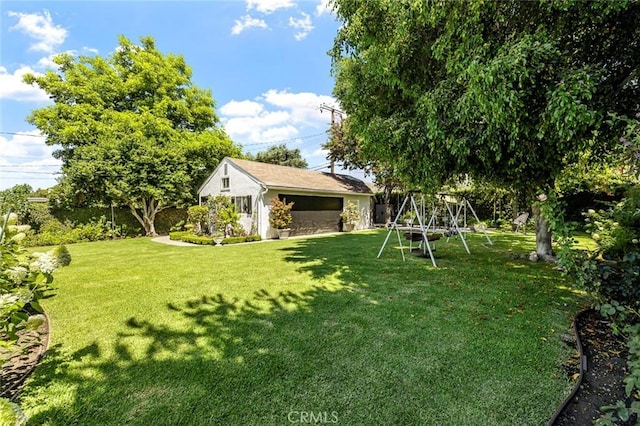 19129 E Orangepath St, Glendora, CA 91741 - view of grassy yard featuring an outdoor structure and a playground
