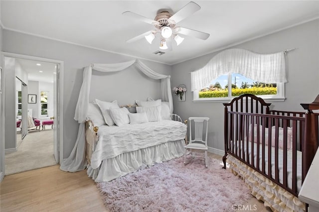 19129 E Orangepath St, Glendora, CA 91741 - bedroom featuring multiple windows, wood finished floors, a ceiling fan, and baseboards