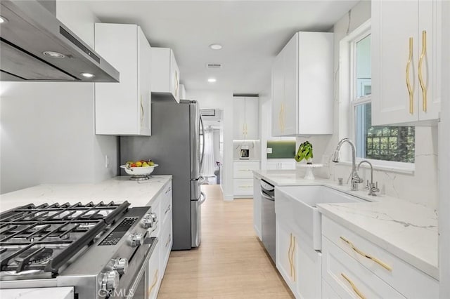 19129 E Orangepath St, Glendora, CA 91741 - kitchen featuring range hood, appliances with stainless steel finishes, a sink, white cabinetry, and recessed lighting