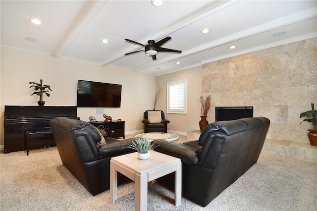 living room with ceiling fan, beamed ceiling, baseboards, light colored carpet, and recessed lighting