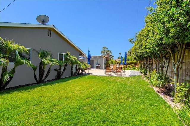 view of yard with a patio area
