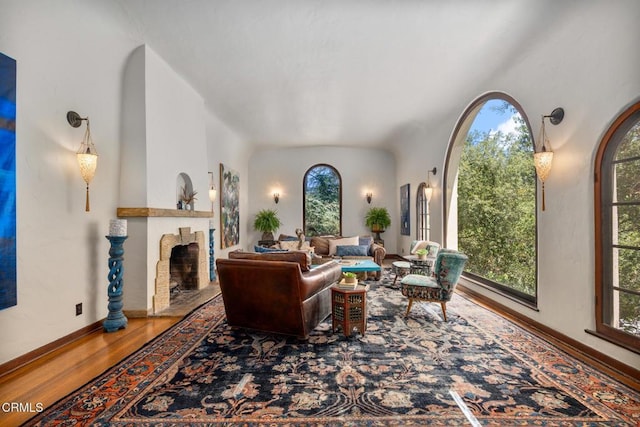 2707 Hermosita Dr, Glendale, CA 91208 - living room featuring wood finished floors, a fireplace, and baseboards