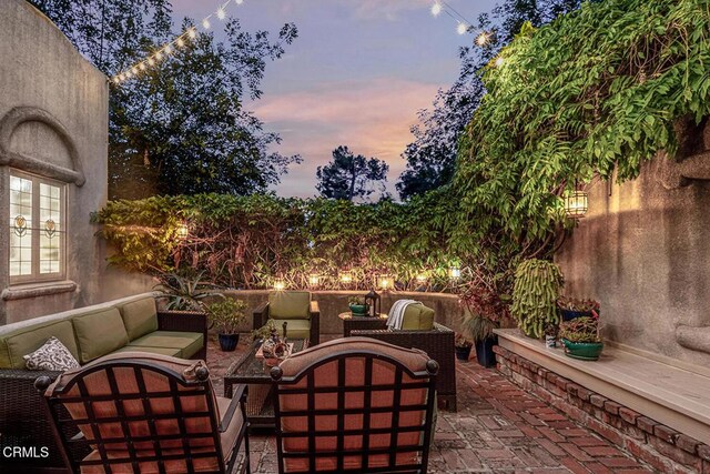 2707 Hermosita Dr, Glendale, CA 91208 - patio terrace at dusk with outdoor lounge area and a patio