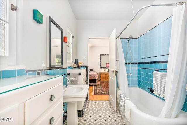 2707 Hermosita Dr, Glendale, CA 91208 - full bathroom with tile patterned floors and shower / bath combination with curtain