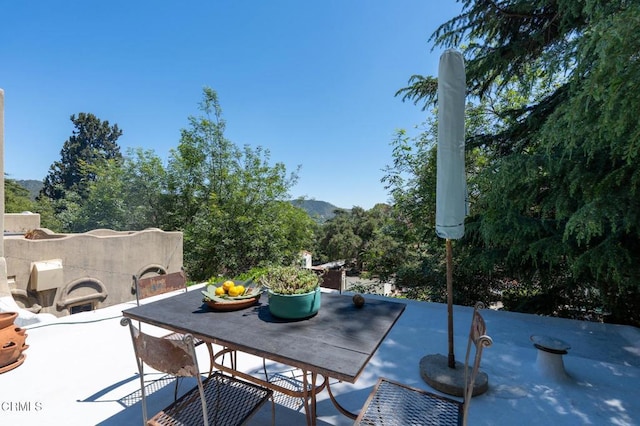 2707 Hermosita Dr, Glendale, CA 91208 - view of patio featuring outdoor dining space and a mountain view