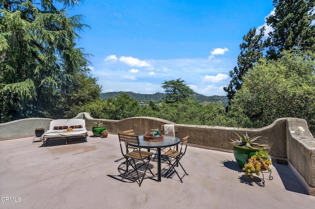 2707 Hermosita Dr, Glendale, CA 91208 - view of patio featuring outdoor dining space and a mountain view