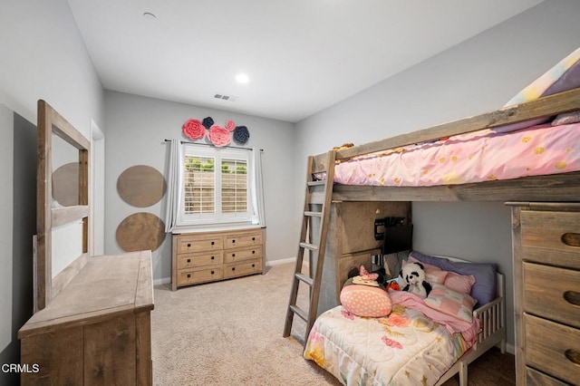 bedroom featuring carpet flooring and baseboards