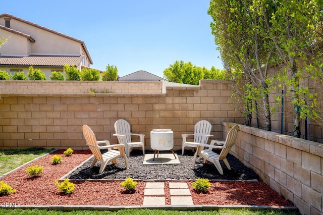 view of patio / terrace featuring fence