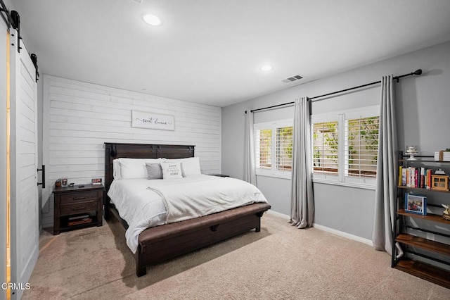 17837 Grapevine Ln, San Bernardino, CA 92407 - carpeted bedroom with a barn door and recessed lighting
