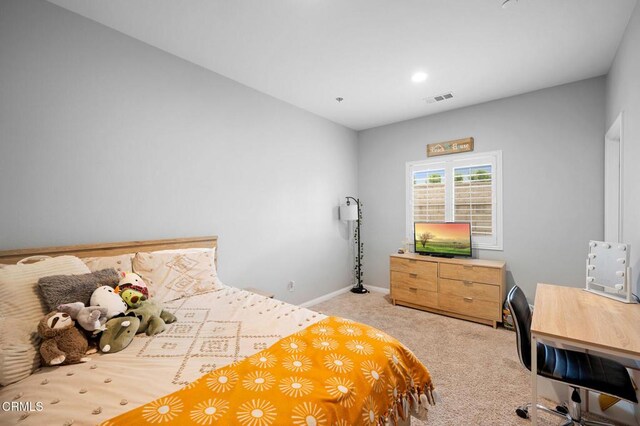 17837 Grapevine Ln, San Bernardino, CA 92407 - bedroom with light carpet and a desk