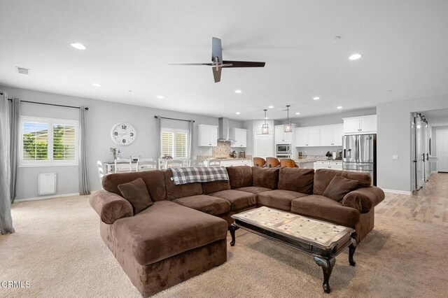 17837 Grapevine Ln, San Bernardino, CA 92407 - living area with recessed lighting, a ceiling fan, and light colored carpet