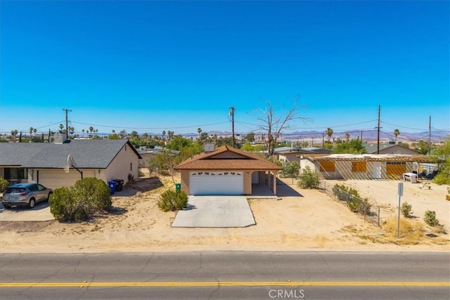 72454 El Paseo Dr Unit 29, Palms, CA 92277 - ranch-style house featuring driveway and a garage