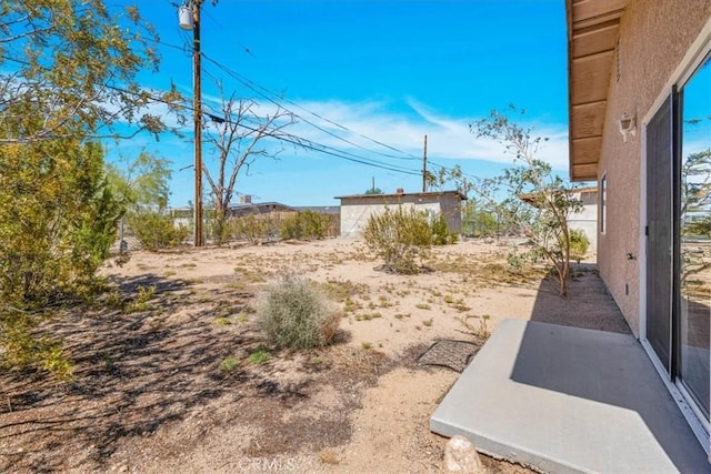 72454 El Paseo Dr Unit 29, Palms, CA 92277 - view of yard with a patio