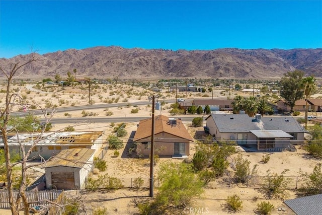 72454 El Paseo Dr Unit 29, Palms, CA 92277 - view of mountain backdrop featuring a desert landscape and nearby suburban area