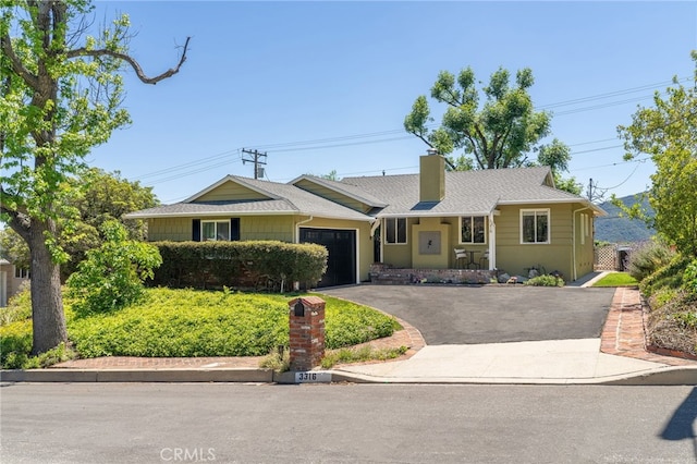 3316 Henrietta Ave, La Crescenta, CA 91214 - single story home with an attached garage, asphalt driveway, a chimney, and a shingled roof